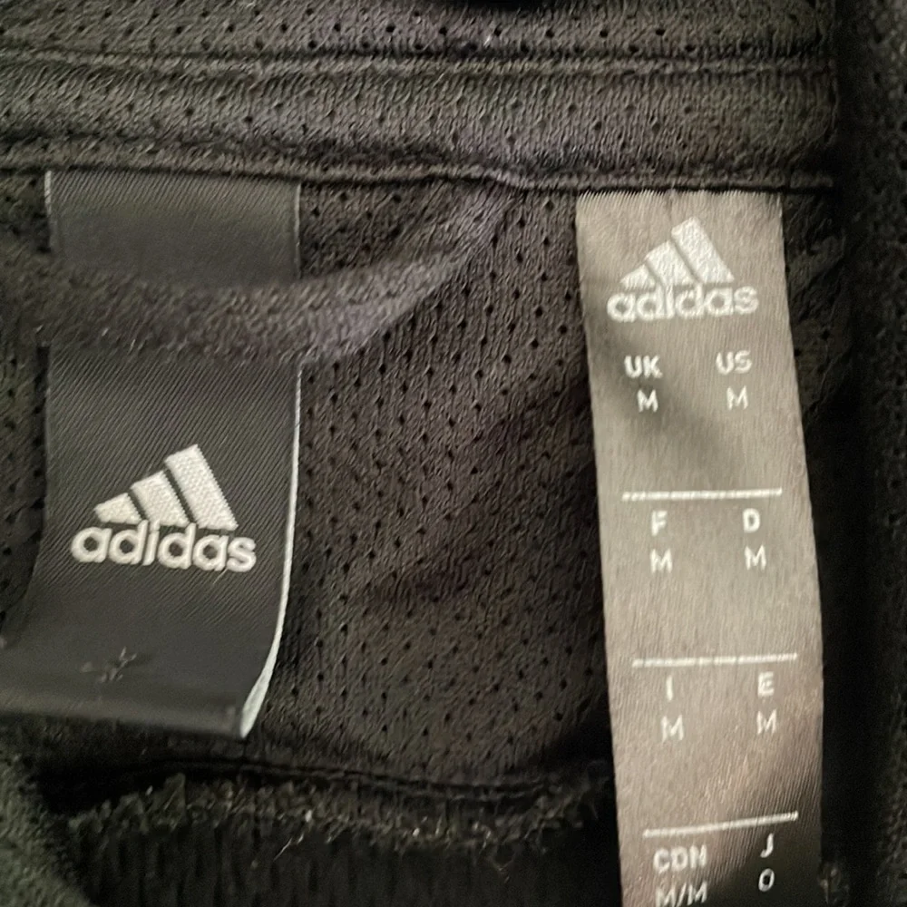 Adidas men’s “For creators only” black & white dri-fit hoodie